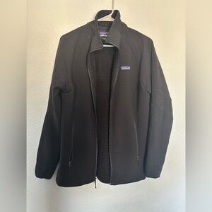 Women’s black Patagonia zip up jacket. Size L